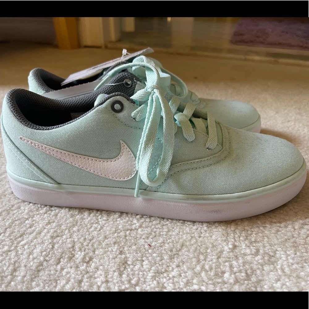 Mint colored Nike shoes